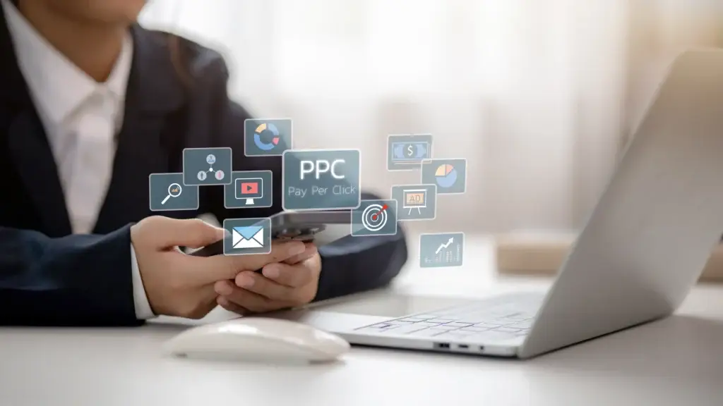 man with phone and PPC logo